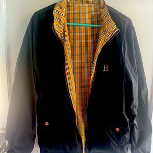 Black revisable Burberry jacket in new condition. Xl runs small